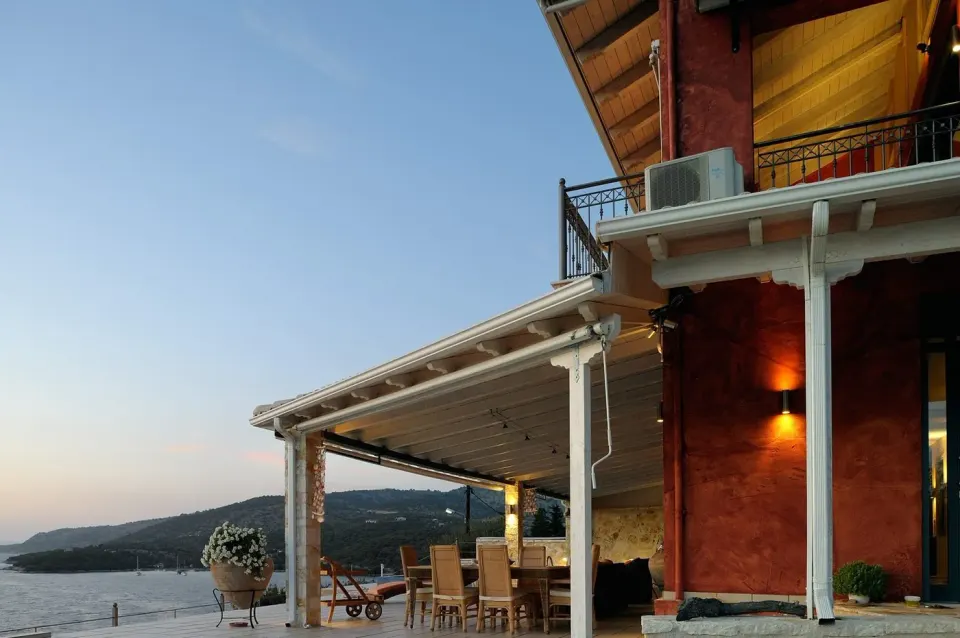 Covered dining patio at dusk